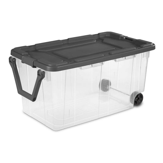 Clear plastic storage bin with gray lid, side handle, and corner wheel