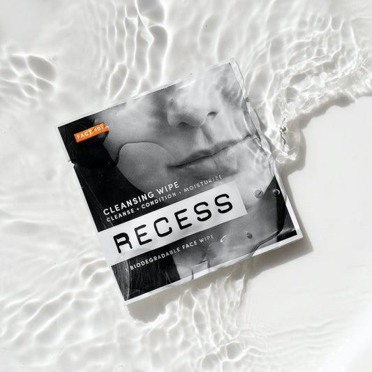 Cleansing wipe pack with black-and-white cover and orange FACE 101 label