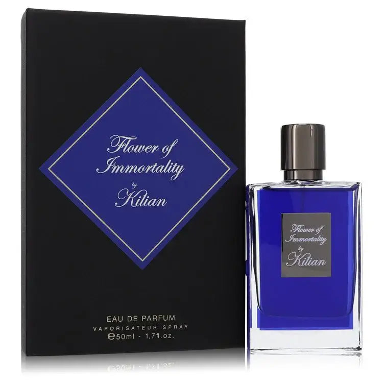 Women's eau de parfum bottle with blue glass and silver cap, paired with printed box