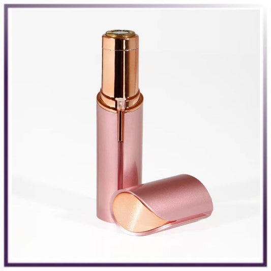 Pink handheld facial hair remover with metallic head and protective cap