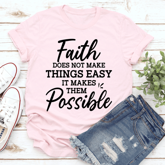 Pink crew-neck T-shirt with large Faith slogan graphic