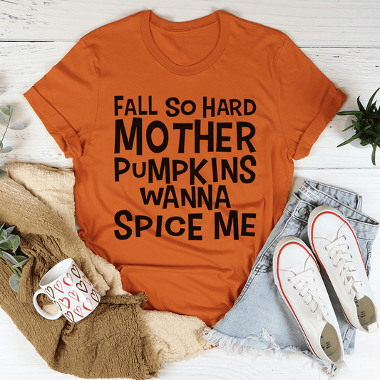 Orange T-shirt with black 'Fall so hard mother pumpkins wanna spice me' graphic