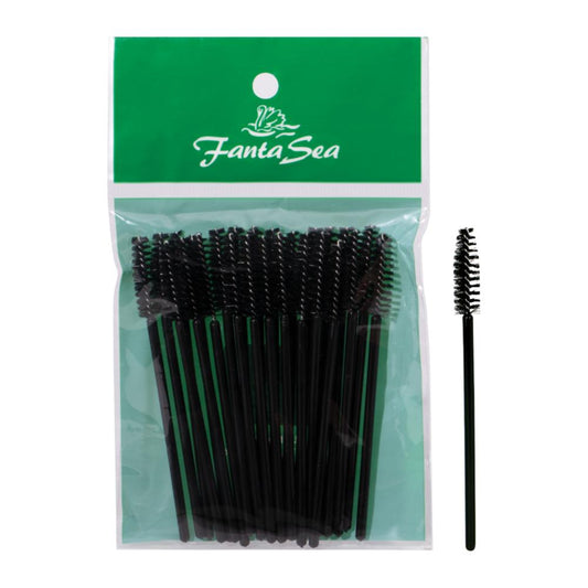 Disposable mascara brush set in clear pouch with black bristles on slender handles
