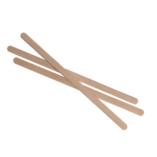 Eyebrow waxing applicators: three light wood slanted sticks