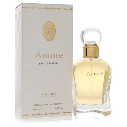 Women's eau de parfum bottle with gold cap, shown beside its matching box