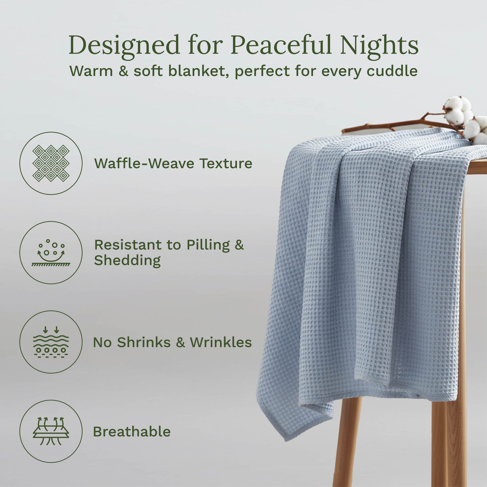 Waffle weave blanket, light blue draped over a chair with waffle texture
