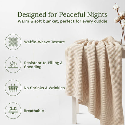 Waffle-weave blanket in light beige, draped over a chair back.