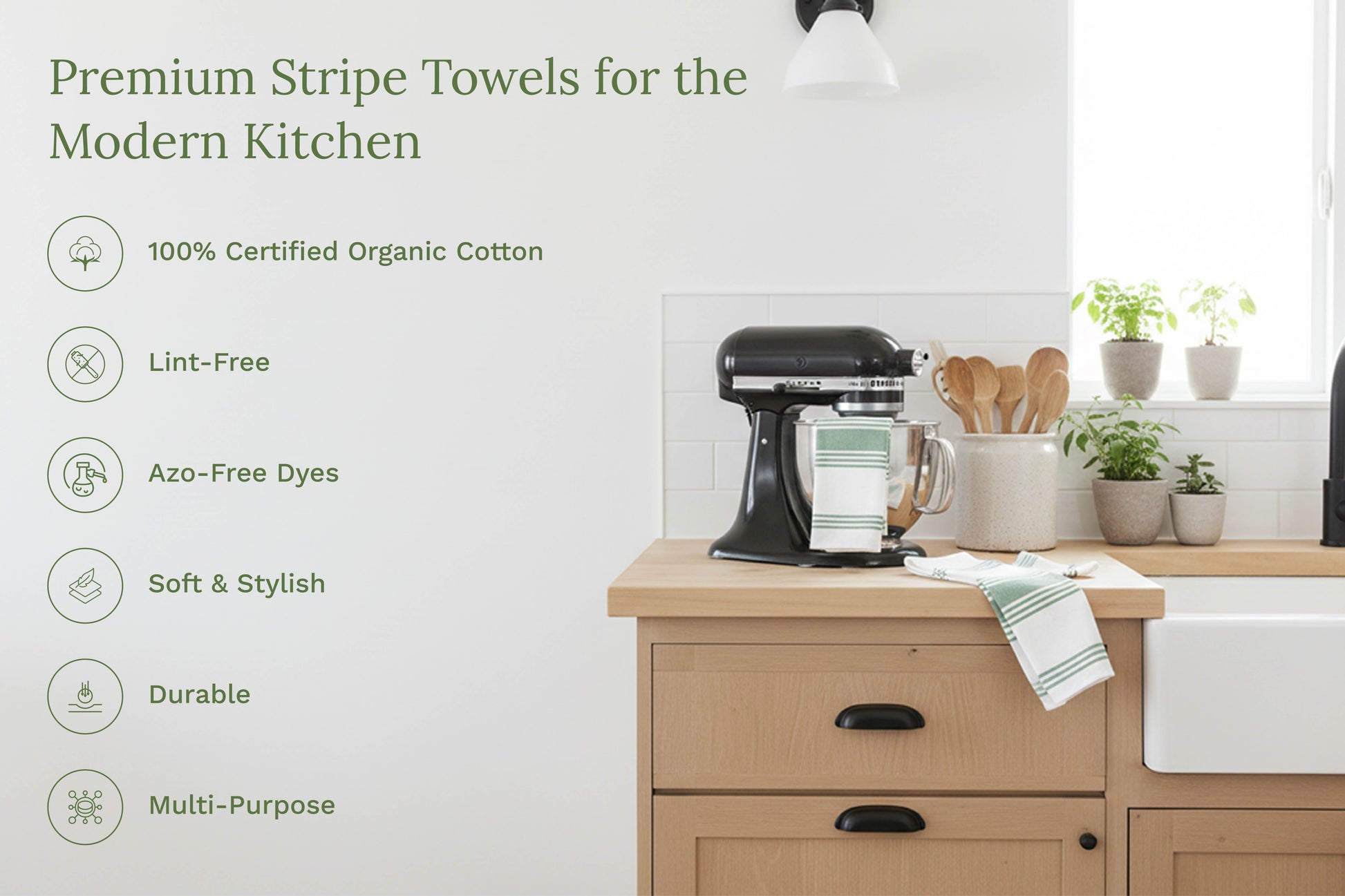 Striped kitchen towels on a kitchen counter, white with green stripes
