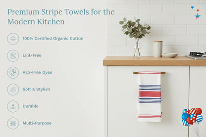 Red, white, and blue striped kitchen towels hanging on a cabinet