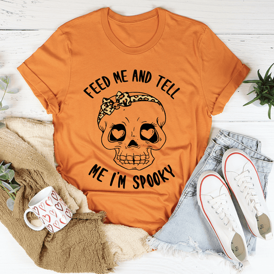 Burnt orange T-shirt with spooky skull graphic and heart eyes