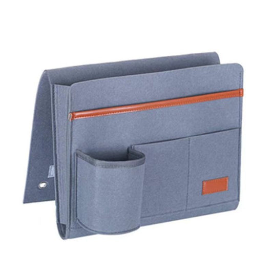 Dark gray felt couch storage organizer with orange trim and front pocket panels