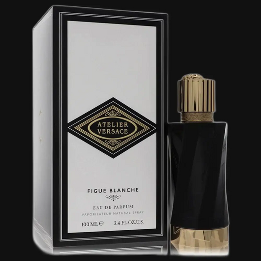 Figue Blanche eau de parfum: dark glass bottle with gold ribbed cap, boxed set