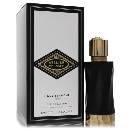 Figue Blanche eau de parfum bottle and black-and-gold presentation box, gold cap
