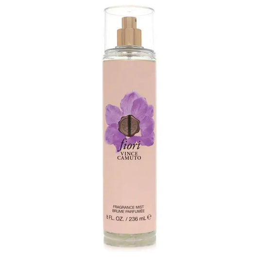 Women’s body mist bottle with clear spray cap, pale pink liquid, and purple flower logo