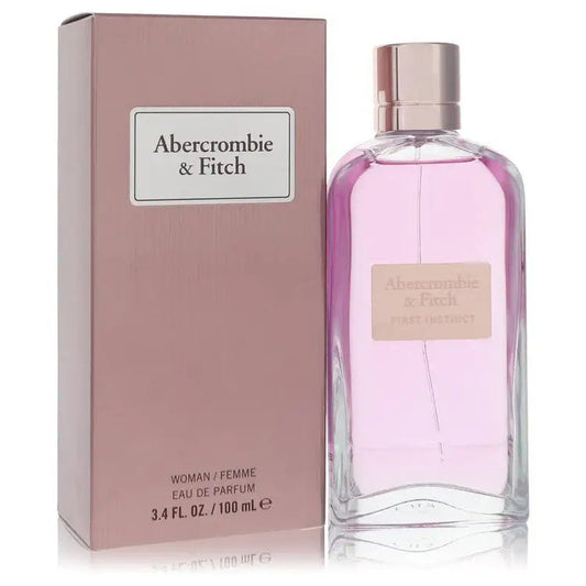 Women's eau de parfum bottle with box, Abercrombie & Fitch, soft pink glass.