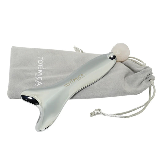 Fish-shaped scraping plate with ball handle and drawstring pouch