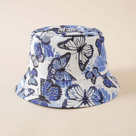 Blue-and-white butterfly print bucket hat with wide brim and stitched panel bands