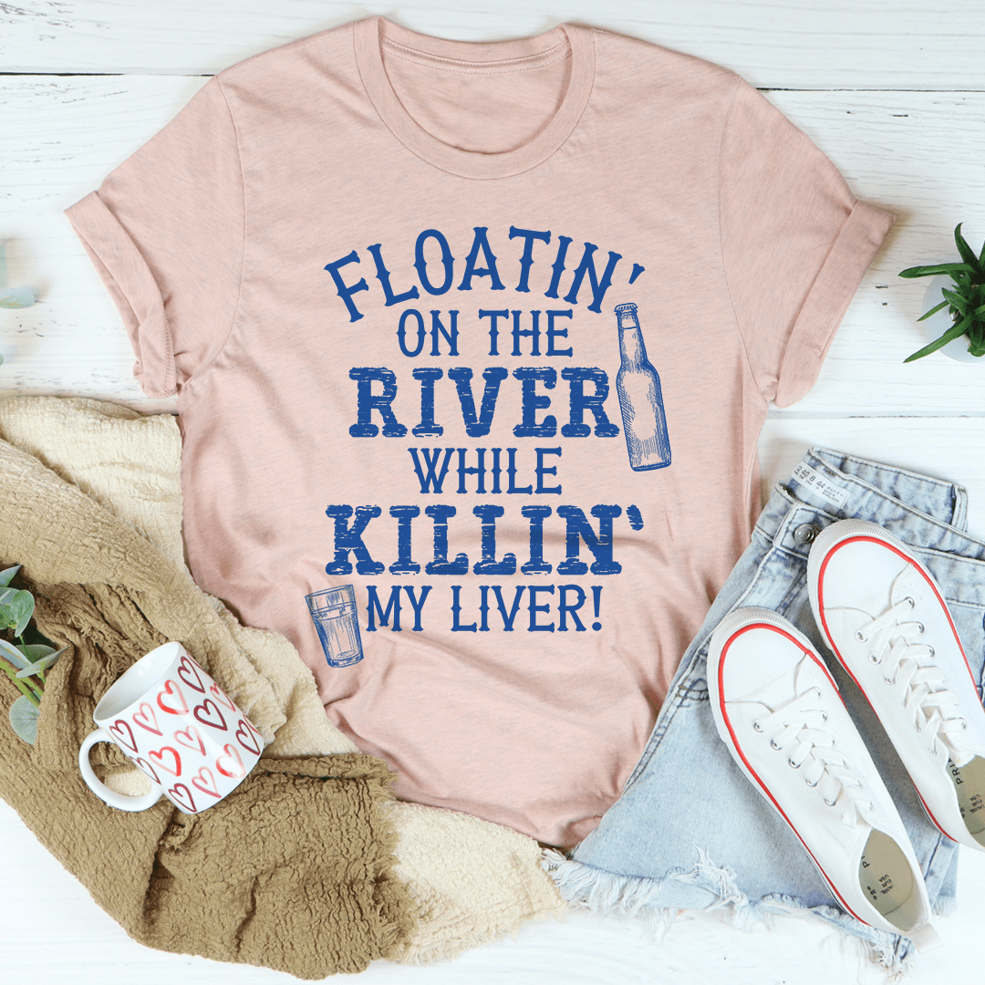 Dusty pink crewneck t-shirt with blue river and kitten slogan graphic