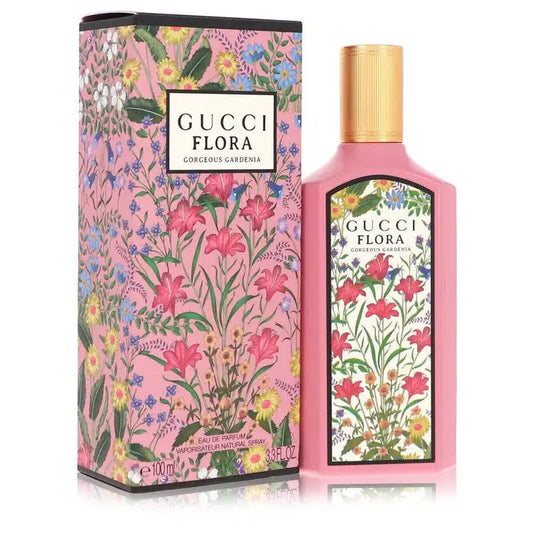 Floral Eau de Parfum bottle with gold cap and decorative Gucci Flora Gardenia box