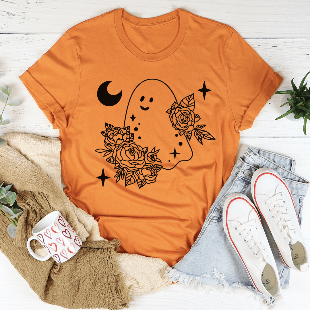 Orange floral ghost graphic t-shirt with moon and star icons, crew neck.