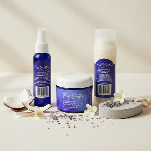 Lavender foot care bundle with blue spray bottle, cream jar, balm bottle, and pumice sponge