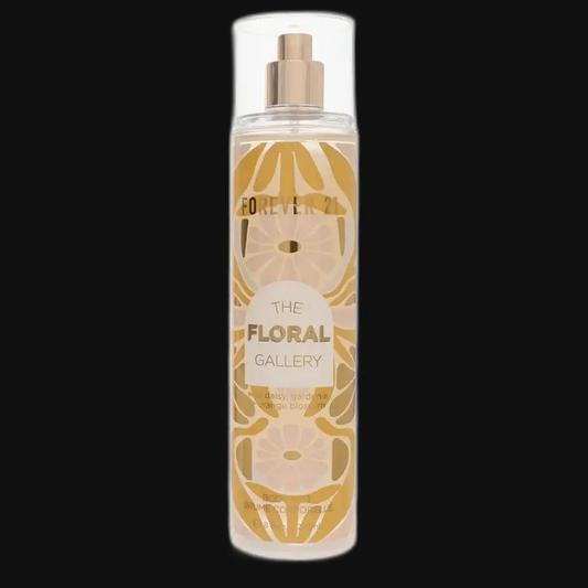 Women's floral perfume bottle with gold spray cap and amber liquid, Floral Gallery label