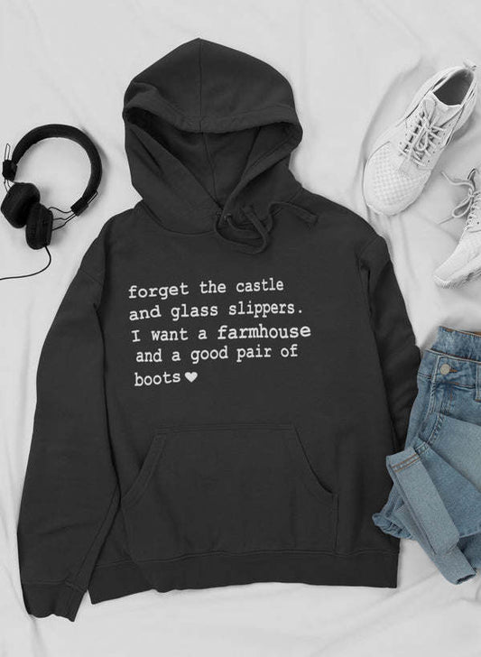Black hoodie with hood, front pocket, and printed quote on the chest