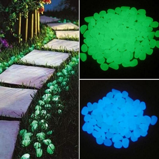 Glow-in-the-dark garden pebbles, bright green glowing stones on black