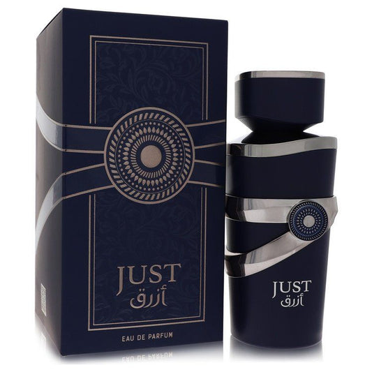 Eau de parfum spray bottle in dark blue with silver cap and ornate label, with gift box