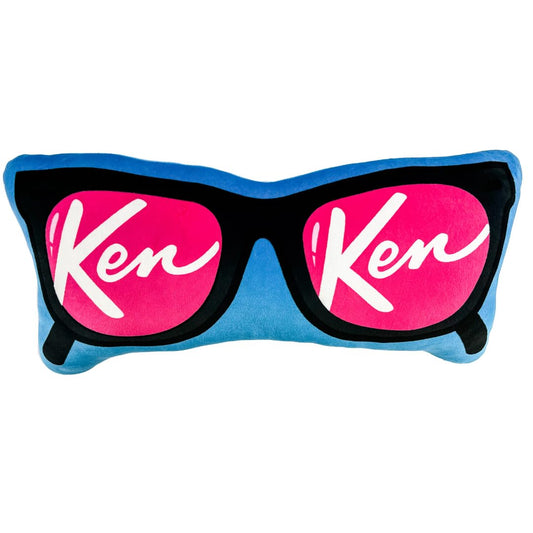 Decorative plush pillow with blue background and large 'Ken' heart sunglasses print