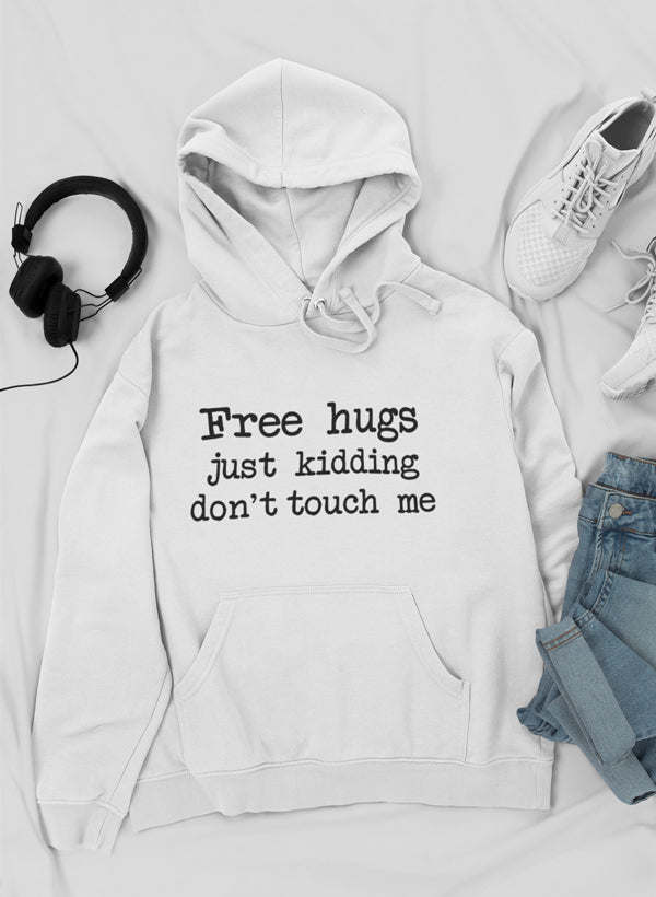 White hoodie with kangaroo pocket and hood; “Free hugs just kidding don’t touch me”