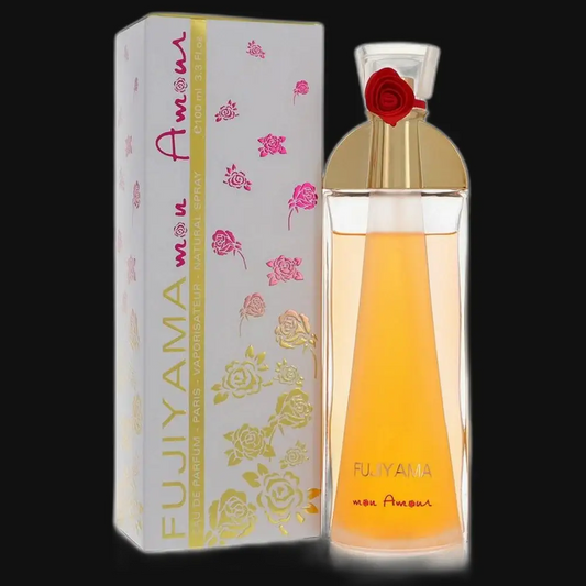 Fujiyama Mon Amour perfume bottle with gold top and red rose accent beside white box