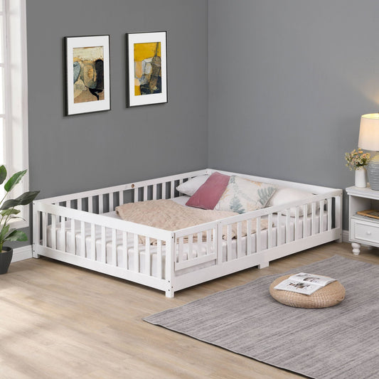 White toddler floor bed frame with vertical safety rails and light wood slats