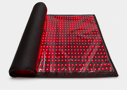 FullGlow light therapy mat rolled and flat, featuring a red LED light panel