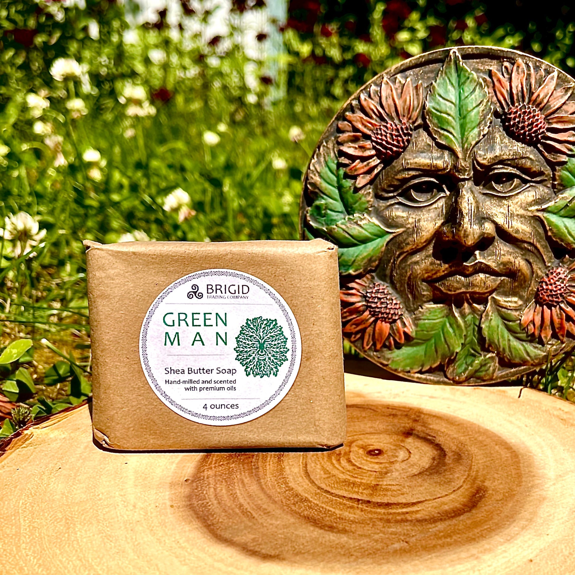 Shea butter soap bar in kraft paper with 'Green Man' label, 4 ounces.