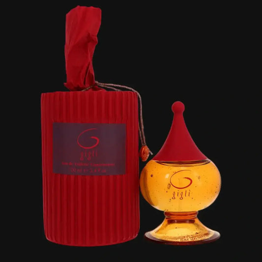 Women’s perfume set: amber bottle with red cap and red fabric-wrapped holder