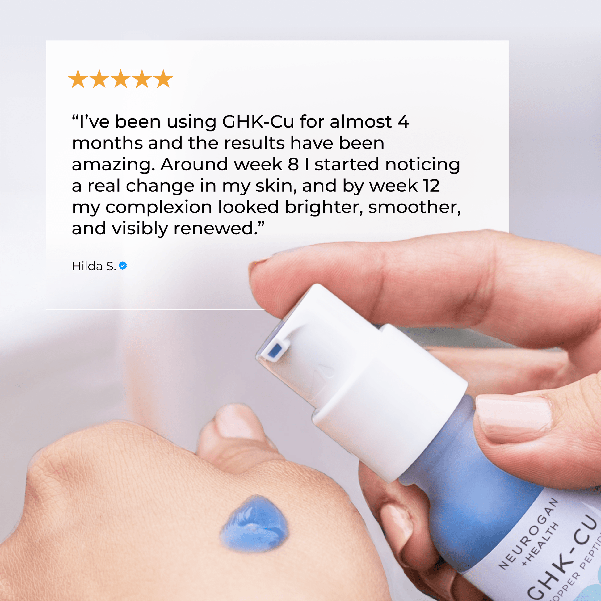 GHK-Cu face serum bottle in hand with blue gel on skin for topical application
