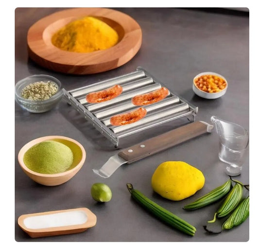 Stainless steel hot dog roller with three sausages and wooden handle, plus toppings