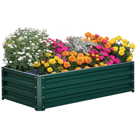 Green galvanized raised garden bed planter box with slatted sides, filled with flowers