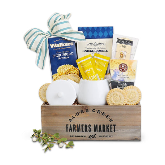 Gift tea tray with wooden box, striped bow, and assorted tea and shortbread biscuits