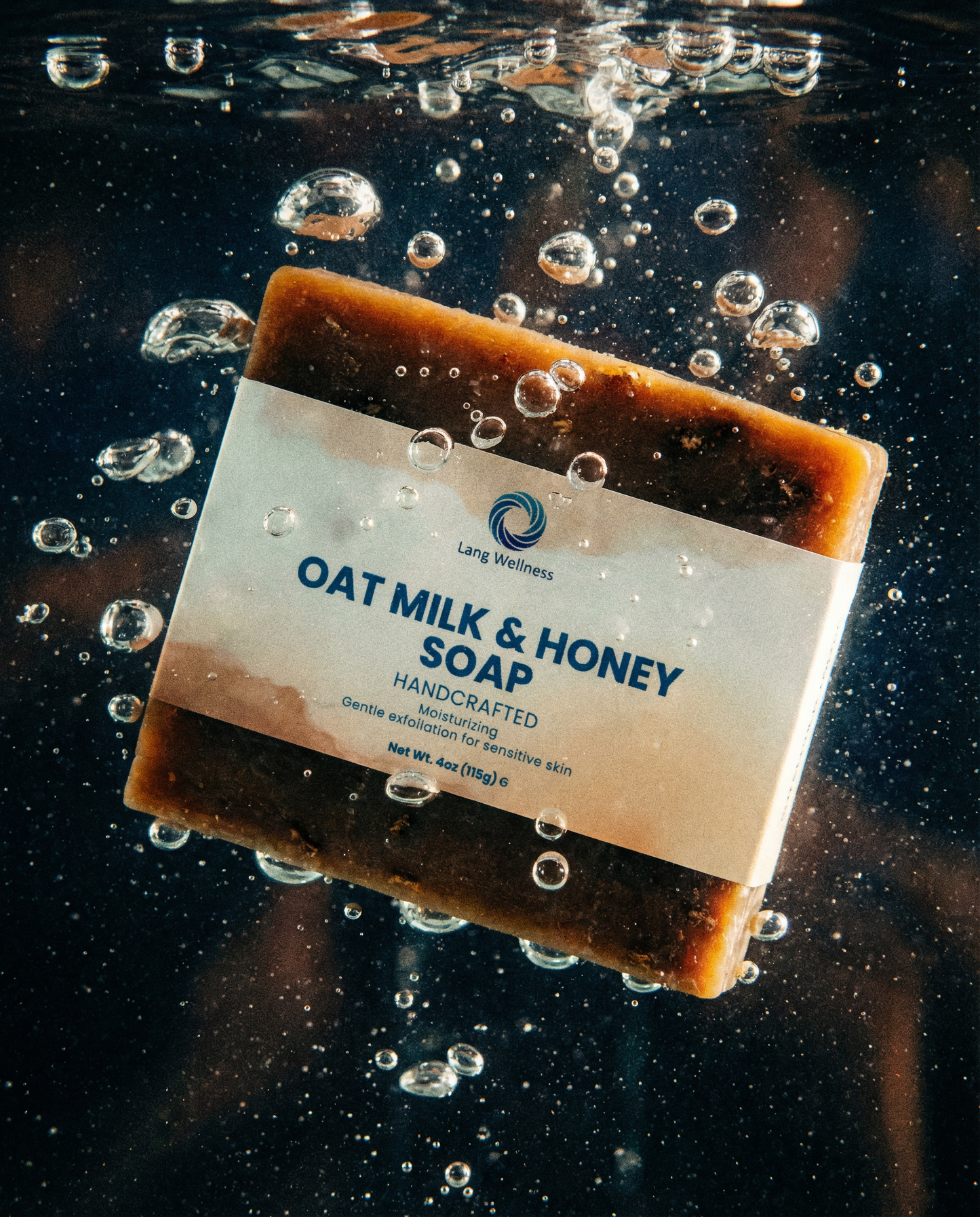 Oat milk & honey soap bar, dark brown with speckled texture and front label