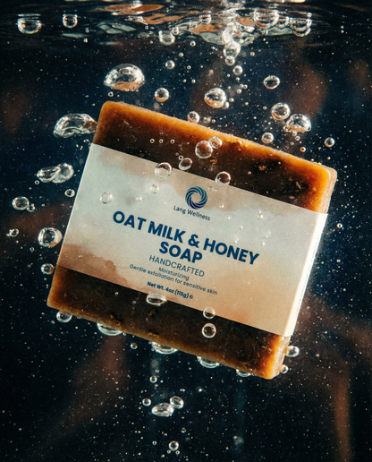 Oat milk & honey soap bar, dark brown with speckled texture and front label