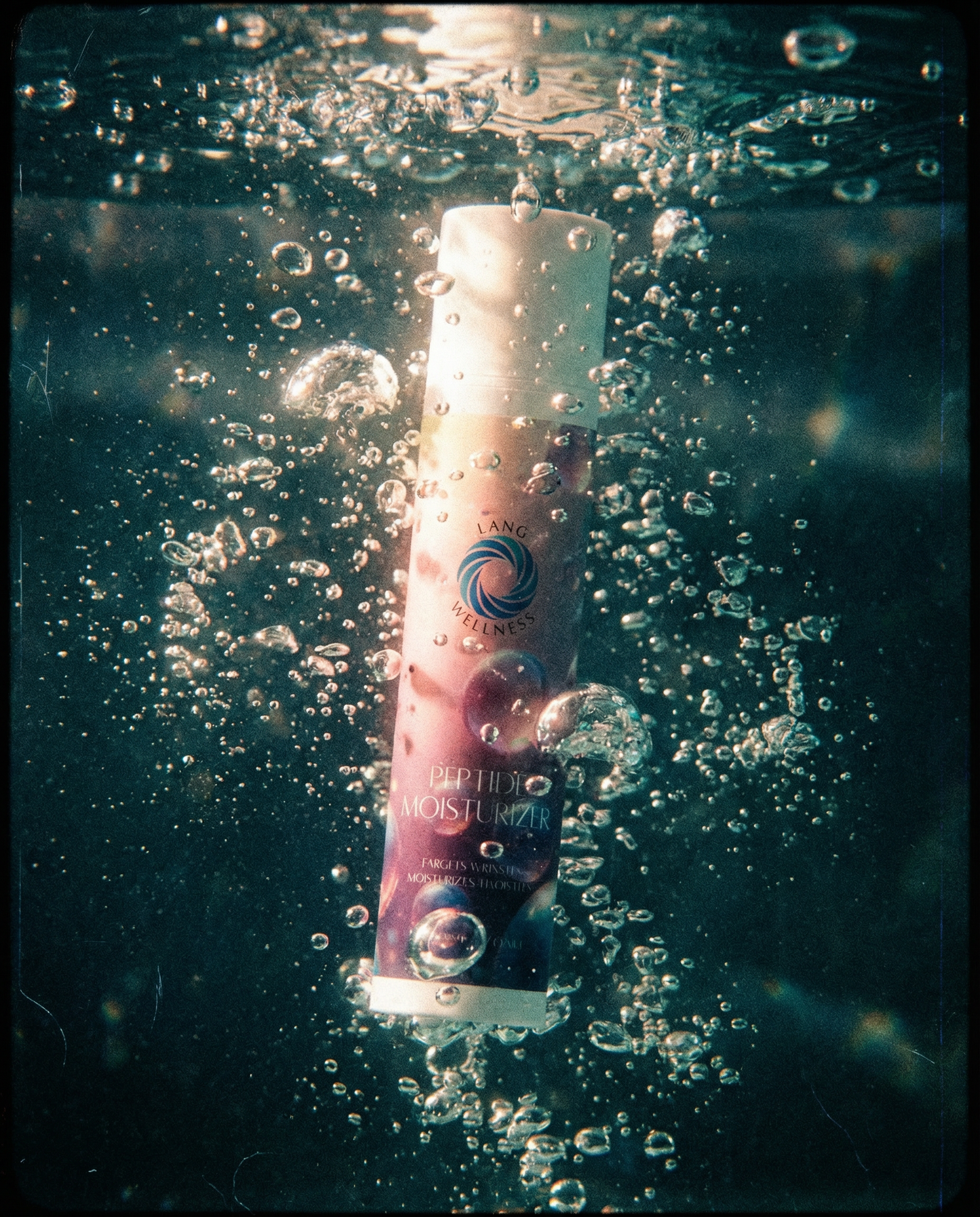 Moisturizer bottle with white cap in splash-like water droplets