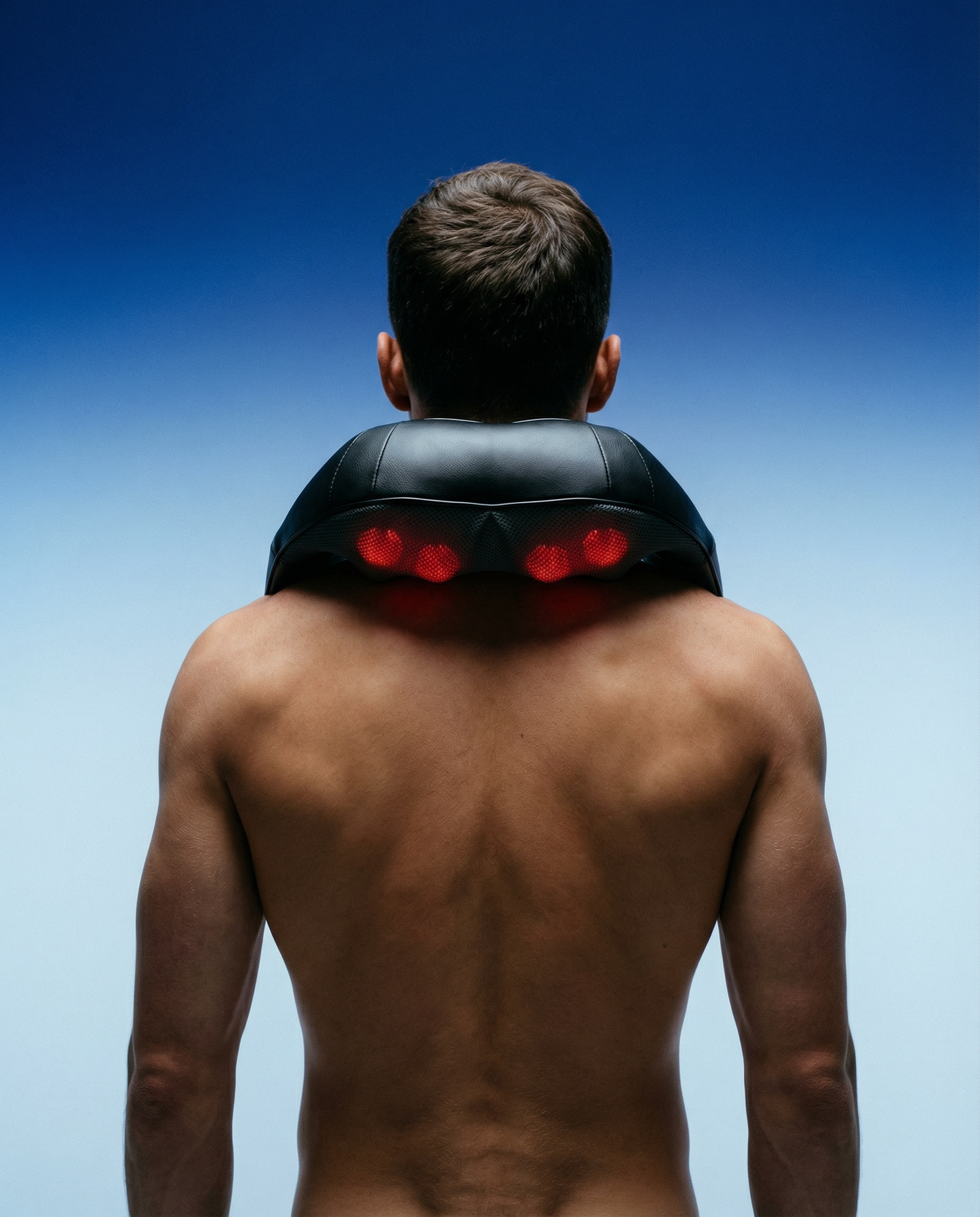 Neck massager wrap, black back view with red illuminated heat spots
