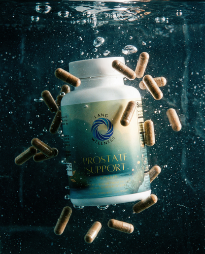 Prostate support supplement bottle with white cap surrounded by floating brown capsules