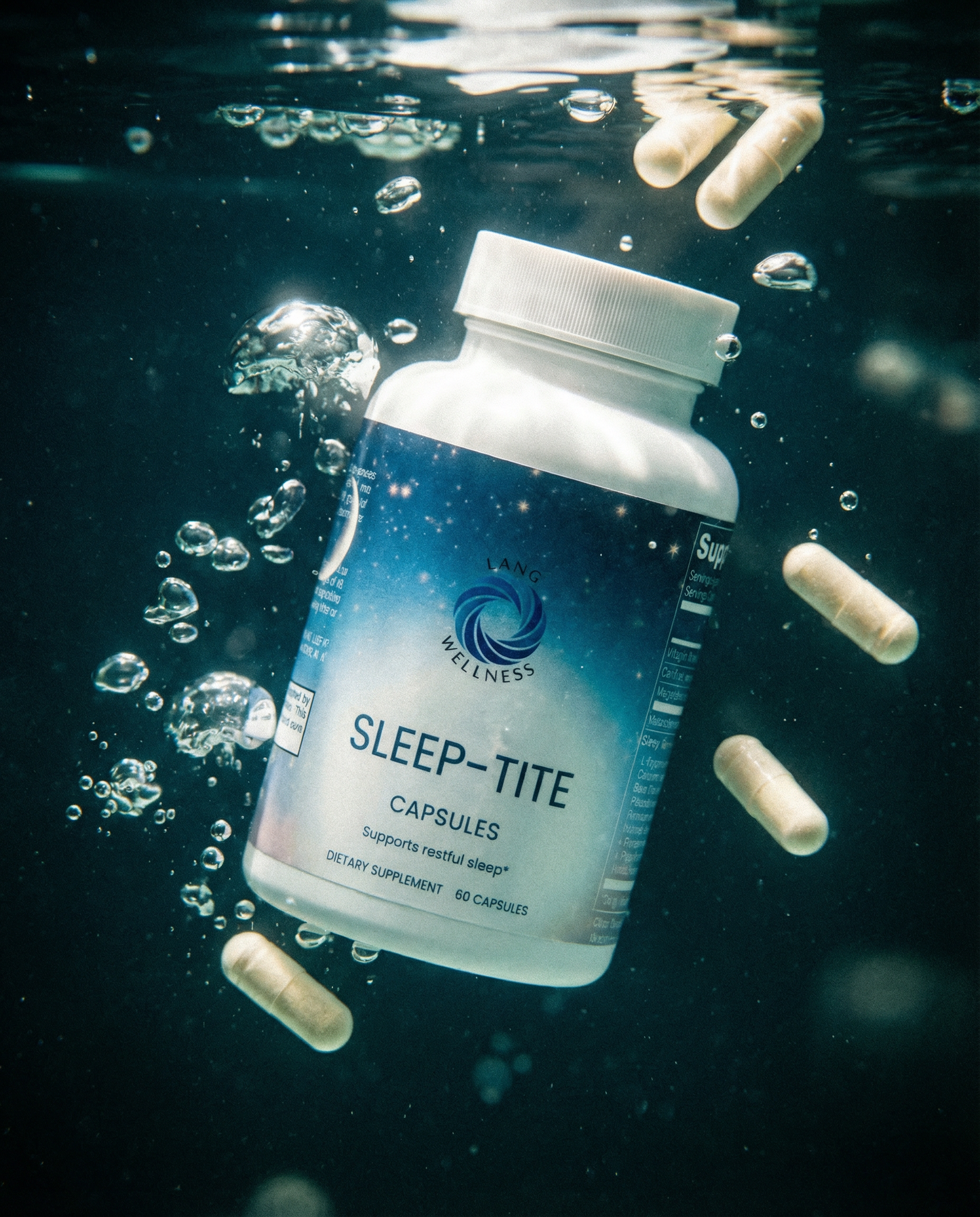 Capsules supplement bottle with blue label and floating capsules in water