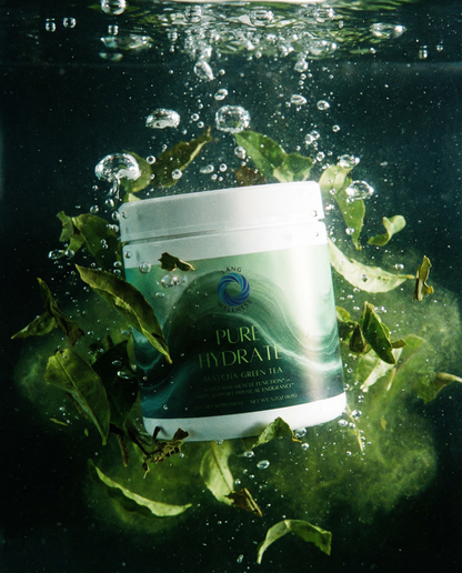 Matcha green tea hydration cream jar with water splashes and green leaves