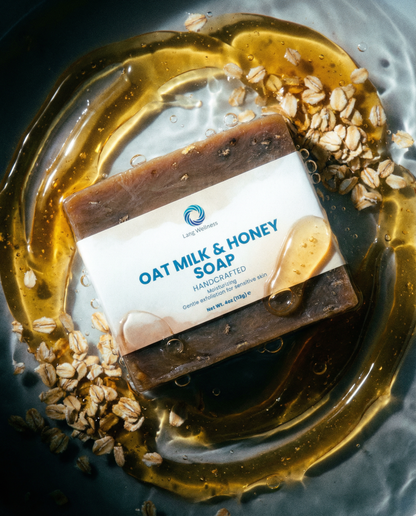 Oat milk & honey soap bar, dark brown with oatmeal specks and label wrapper