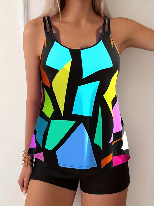 Women's tankini set with geometric print tank top and black boxer shorts, front