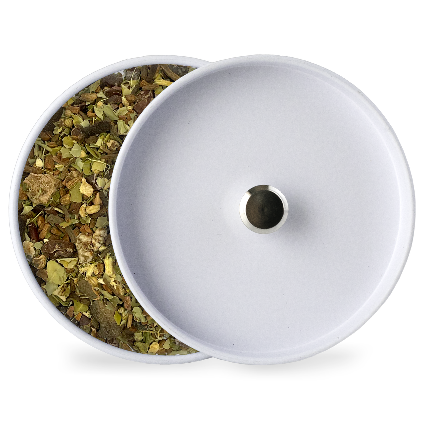 White-lidded container with opening, showing loose herbal tea leaves beside it